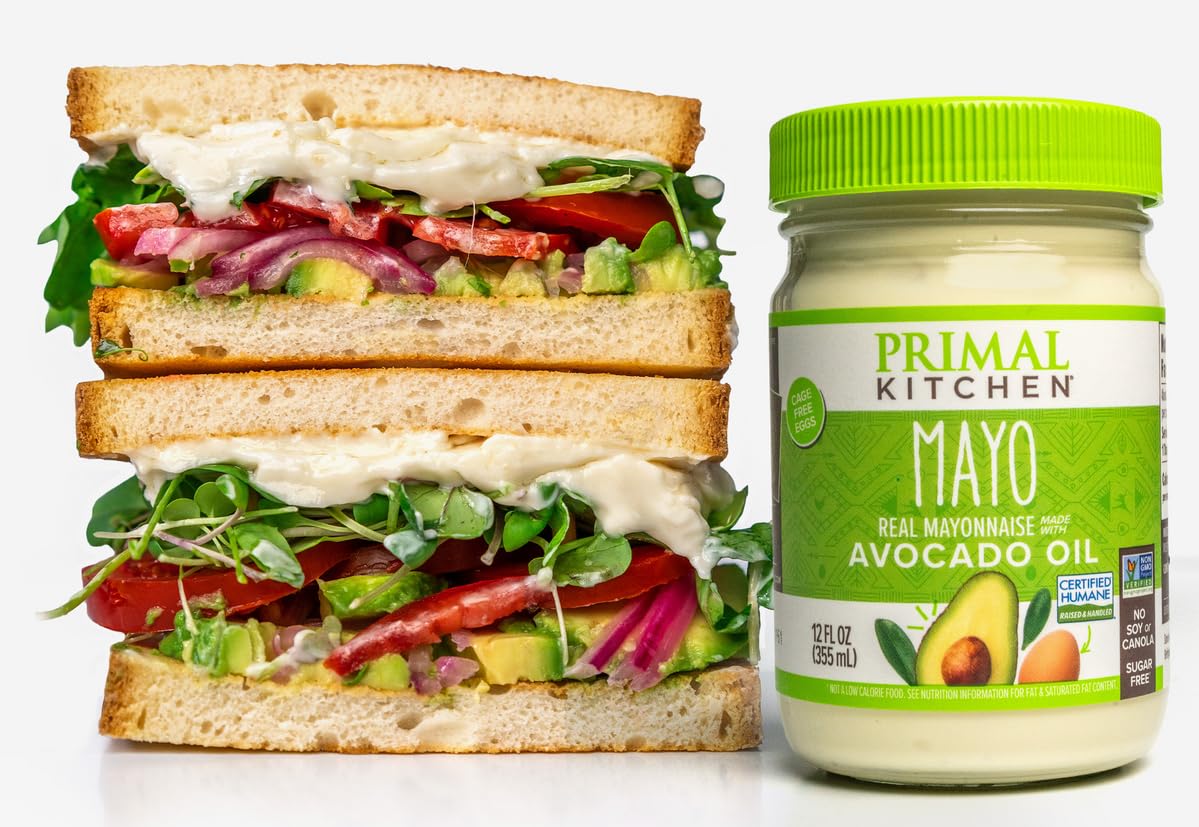 Vegetable sandwich with Primal Kitchen Mayo on a white background