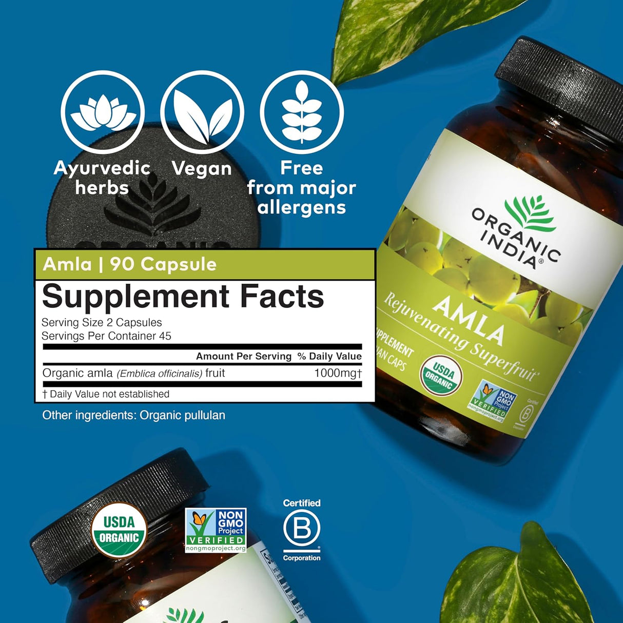 Amala supplement bottle with label and supplement facts on a blue background