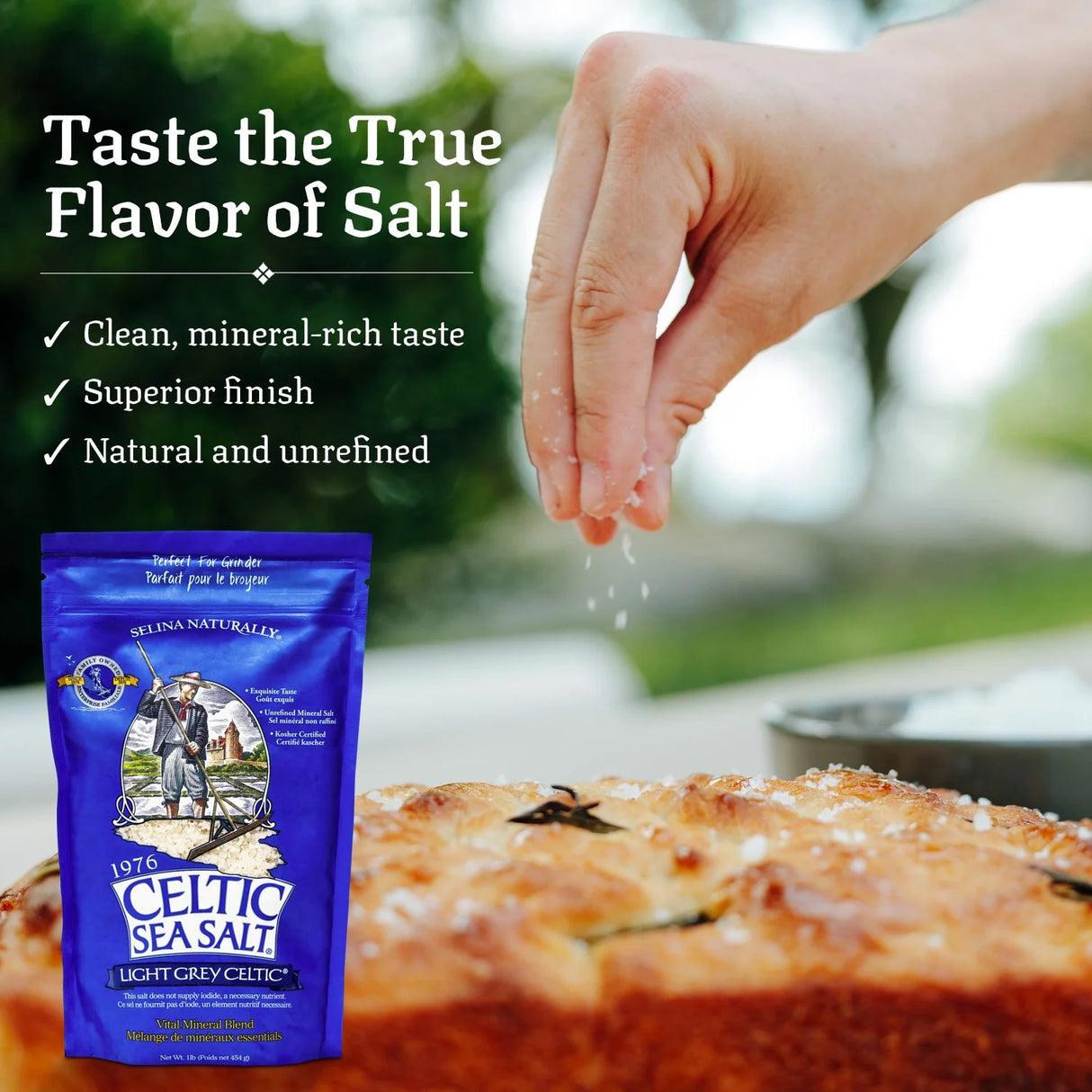 Celtic Sea Salt packet with a hand sprinkling salt over food, outdoor setting