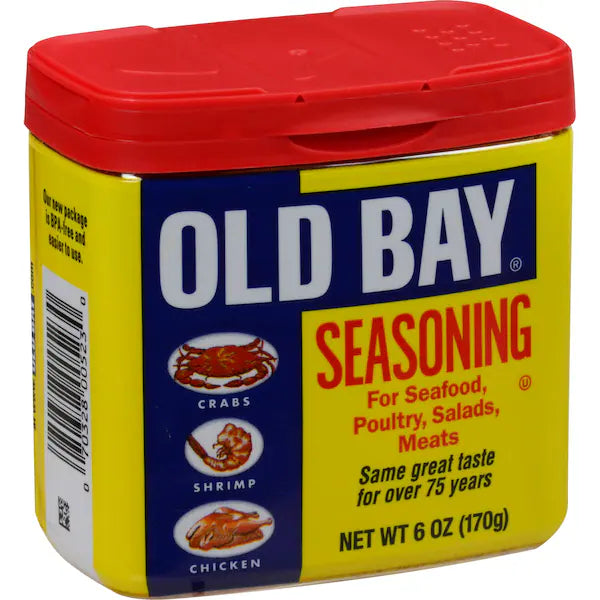 Old Bay seasoning container with red lid on a white background