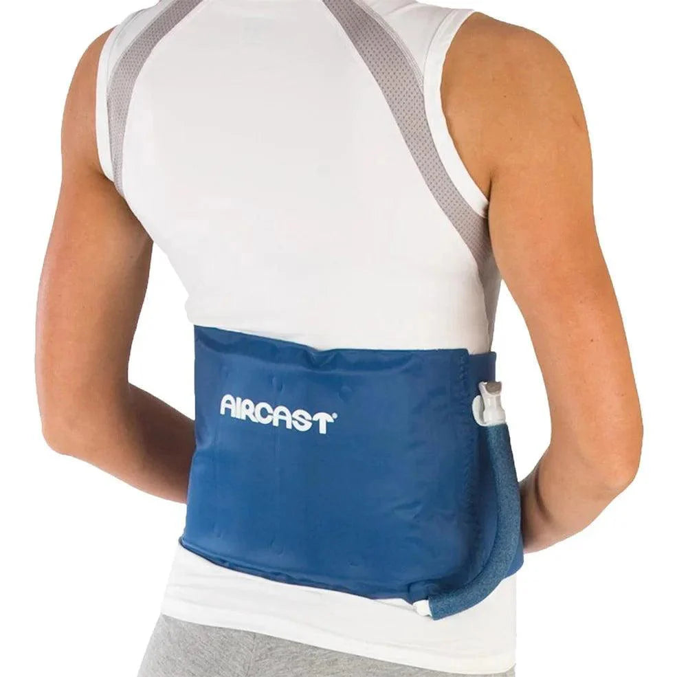Person wearing a blue Aircast brace on their back against a white background