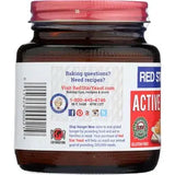 Jar of Red Star Active Dry Yeast with label on a white background