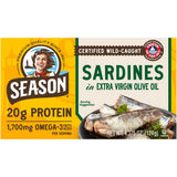 Front packaging of a Season brand box of wild-caught sardines in extra virgin olive oil, featuring a yellow and cream design with product imagery and text.