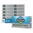 12 boxes of Wild Planet wild white anchovies in extra virgin olive oil on a white background