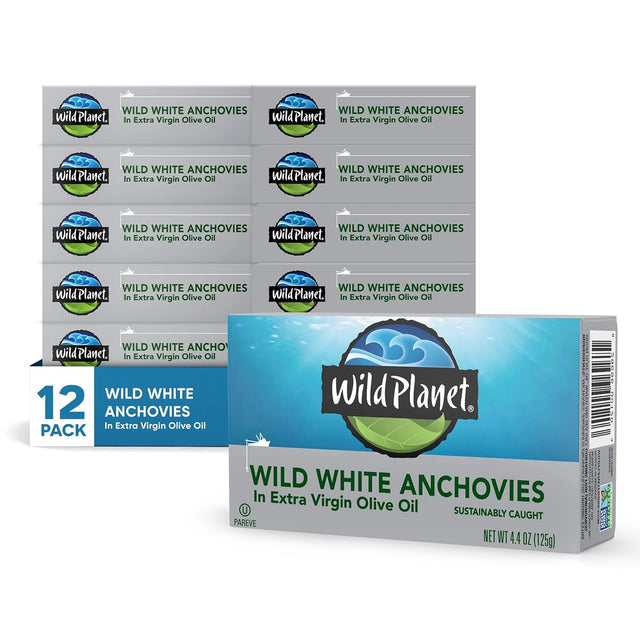 12 boxes of Wild Planet wild white anchovies in extra virgin olive oil on a white background