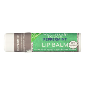 Lip balm stick with green label on a white background