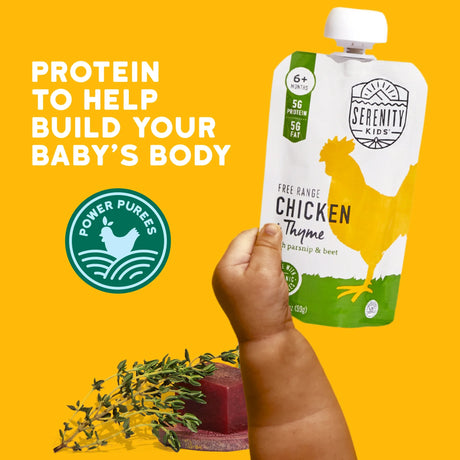 Serenity Kids free-range chicken thyme power puree packaging with a hand holding it against a yellow background.