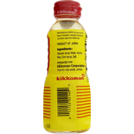 Kikkoman bottle with yellow label and red cap on a white background