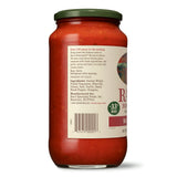 Jar of red sauce with a label on a white background