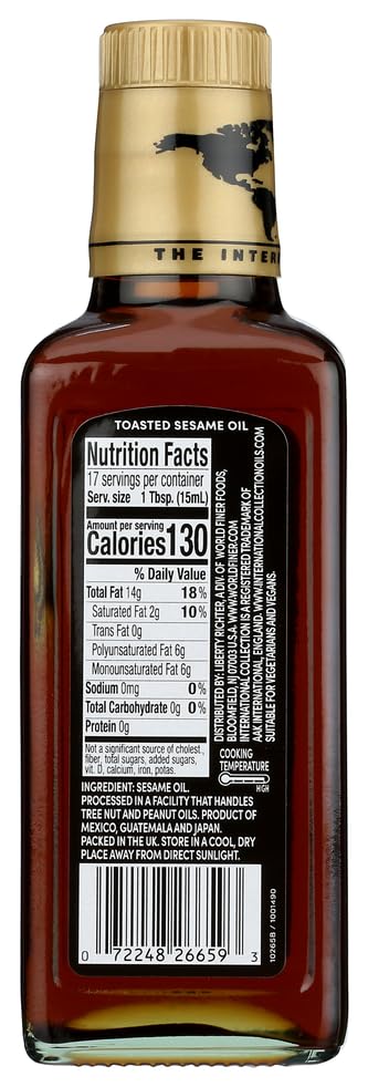 Bottle of toasted sesame oil with nutrition label on a white background