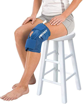 Person sitting on a white stool wearing a blue Pataguard knee brace.