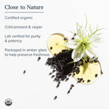 Certified organic product with seeds and a flower on a white background, featuring USDA Organic certification.