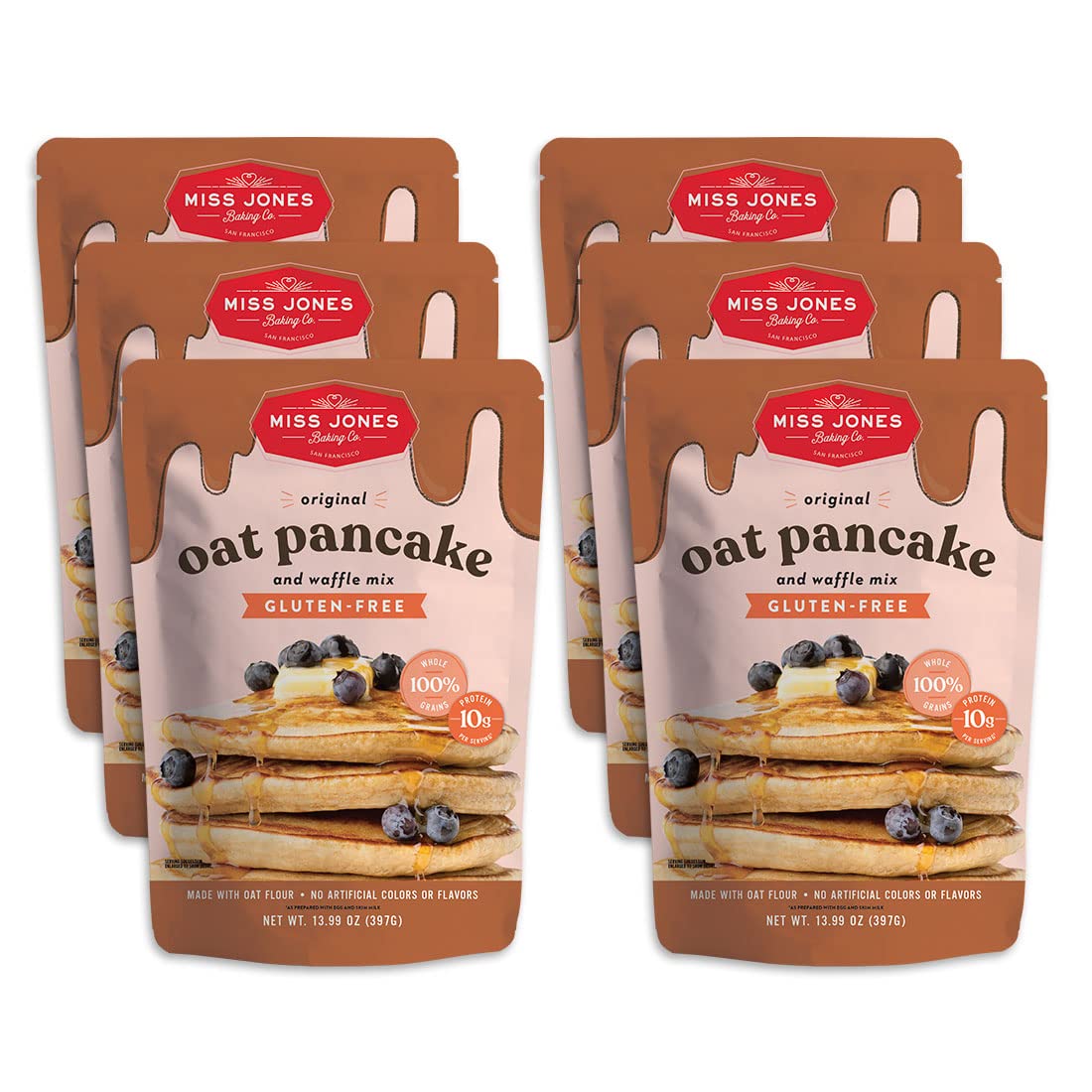 Multiple packages of Miss Jones Baking Co. oat pancake and waffle mix on a white background