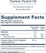 Nutrient-packed oil supplement facts label with serving size, calories, fat content, and organic black cumin seed oil details.
