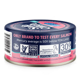 Can of Safe Catch salmon with various certification labels on a white background
