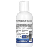 A white bottle of makeup remover shown from the back, featuring a white cap, product ingredients printed in black text, a blue barcode band, and a QR code on a plain white background.