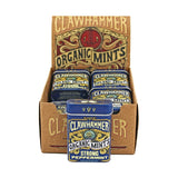 Display box of Clawhammer Organic Mints with multiple tins on a white background