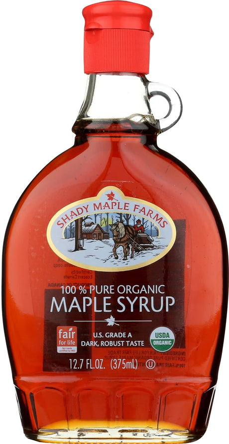 Bottle of Shady Maple Farms maple syrup with a red cap on a white background