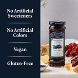St. Dalfour French Grape jam bottle with product details on a dark blue background