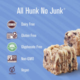 Dessert bars with 'All Hunk No Junk' branding on a blue background with certification logos.