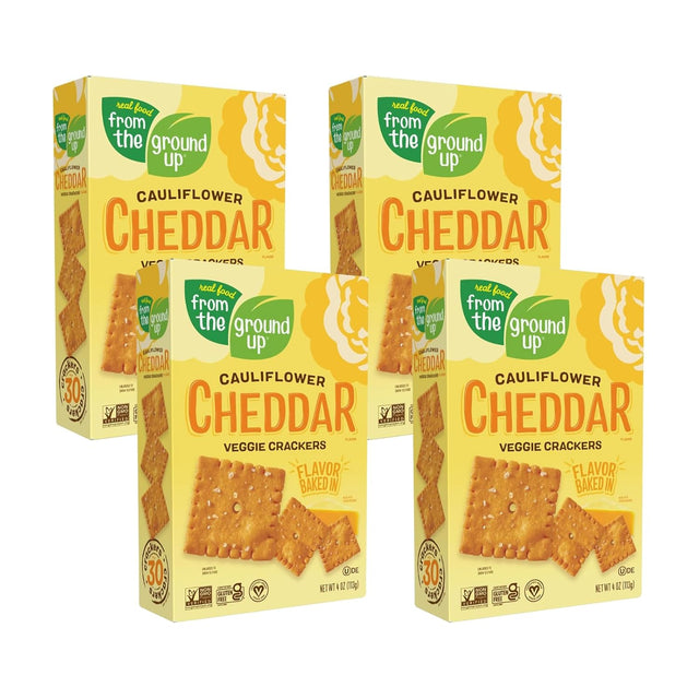 Four boxes of cauliflower cheddar veggie crackers from the ground up on a white background
