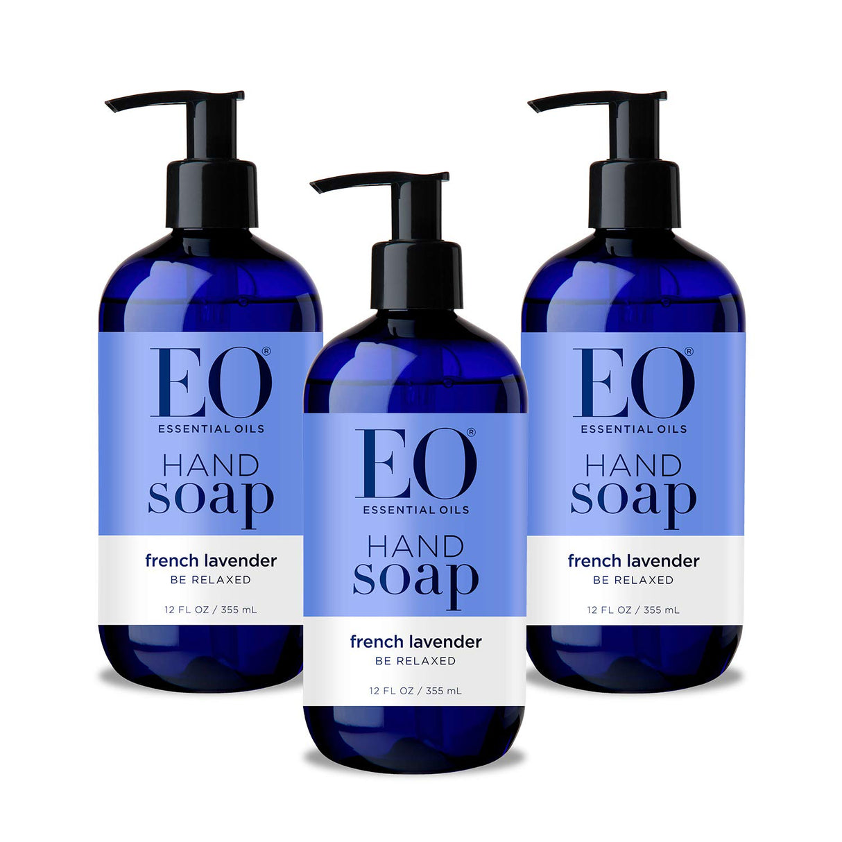 Three bottles of EO Essential Oils French Lavender hand soap on a white background