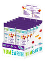 Display of YumEarth organic fruit snack packages on a white background