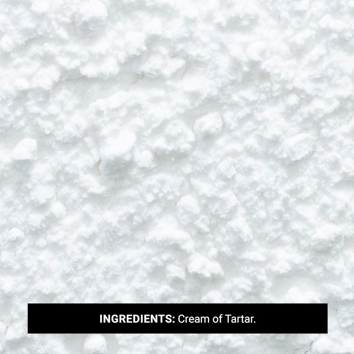 Close-up of white powder labeled 'Ingredients: Cream of Tartar' on a white background