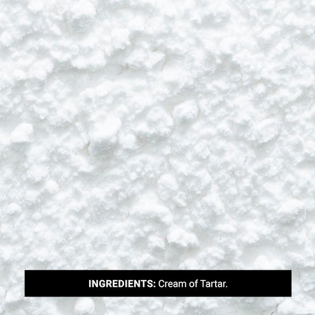 Close-up of white powder labeled 'Ingredients: Cream of Tartar' on a white background