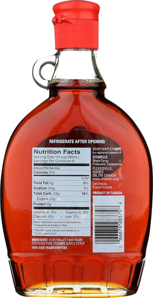 Bottle of maple syrup with nutrition facts label on a white background