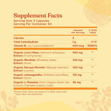 Supplement facts label with various health benefits on a beige background