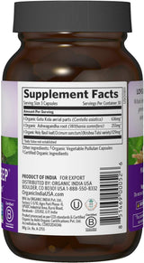 Supplement bottle with label showing 'Supplement Facts' and product details.