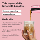 Glass of latte being poured with text about benefits on a pink background