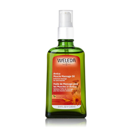 Weleda Arnica Muscle Massage Oil bottle on a white background