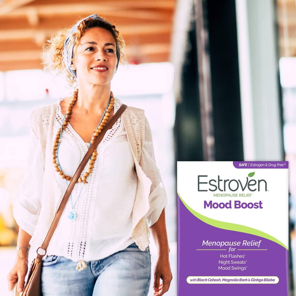 Woman walking outdoors with a product package for Estroven Mood Boost Menopause Relief.
