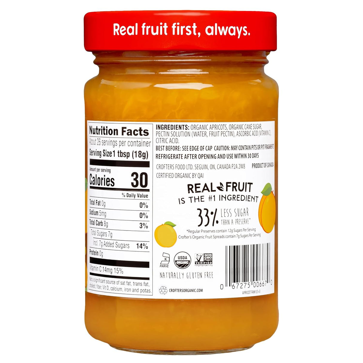 Jar of fruit spread with a red lid and nutrition label on a white background