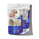 Back view of a packaged snack with branding and nutritional information on a white background
