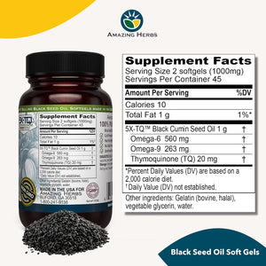 Supplement bottle with label and black seed oil on a white background