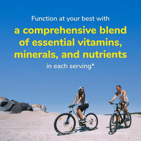 Two people riding bicycles on a beach with a blue sky, promoting vitamins and minerals.