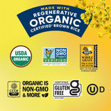 Certification labels for organic, non-GMO, and whole grain rice on a yellow background with flowers.