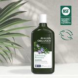 Avalon Organics Volumizing Rosemary Conditioner bottle with green leaves and NSF certification logo on a light gray background.