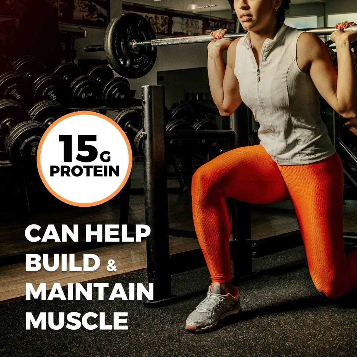 Person lifting weights with a focus on protein benefits in a gym setting