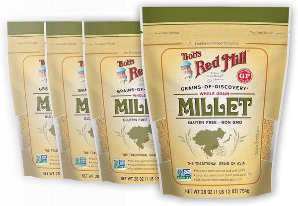 Multiple packages of Bob's Red Mill Millet on a white background