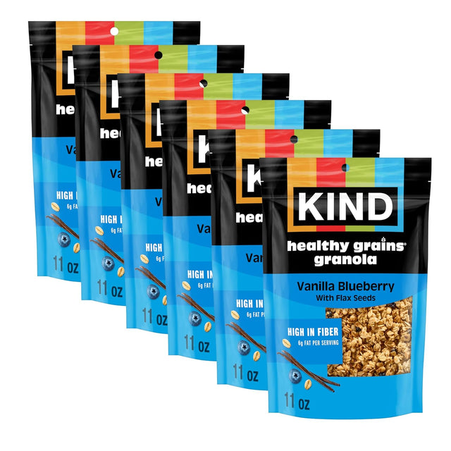 Multiple packages of KIND Vanilla Blueberry healthy grains granola on a white background