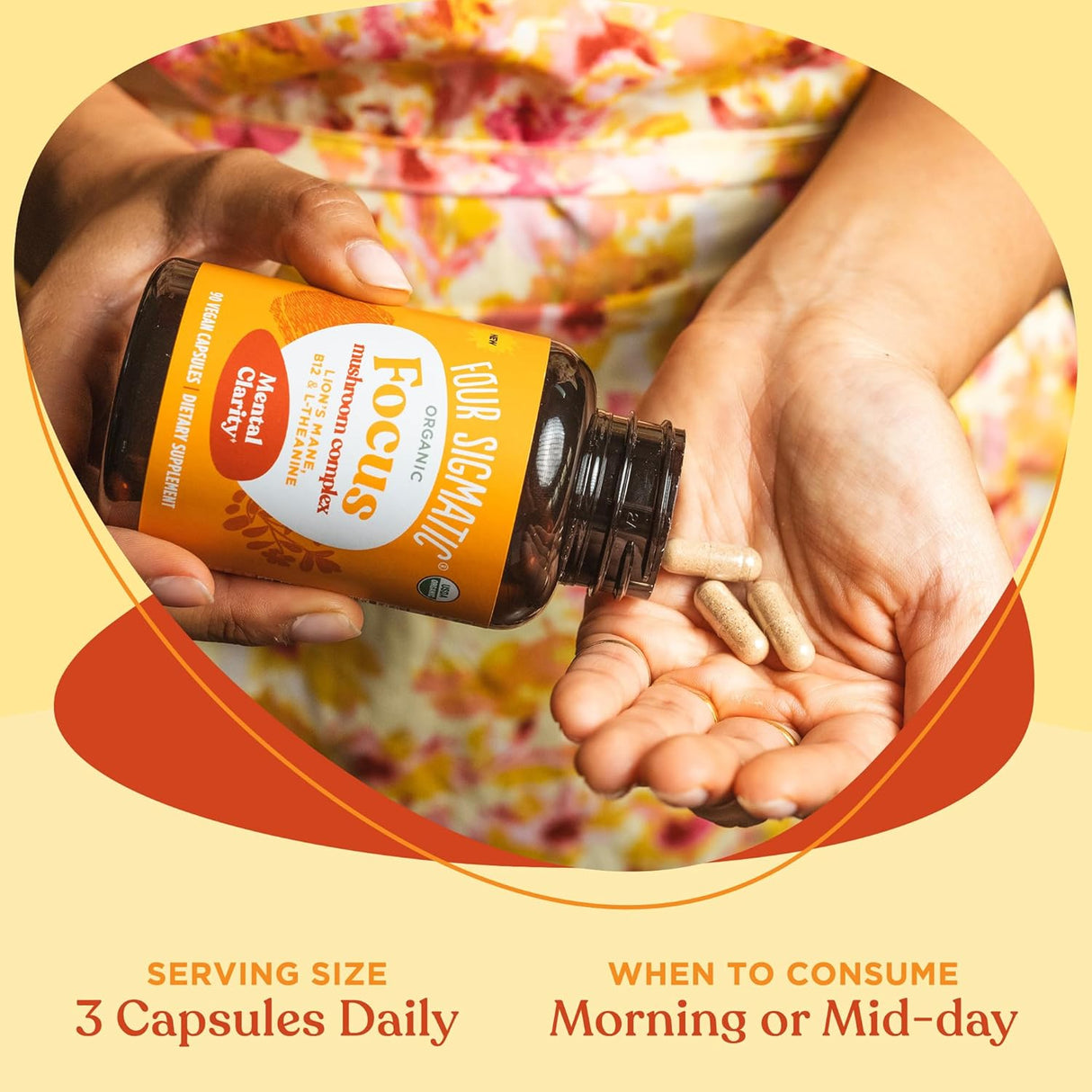 Person holding a bottle of 'Four Sigmatic' focus supplement with visible capsules.