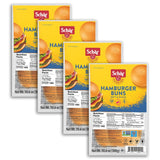 Four packages of Schar Hamburger Buns on a white background