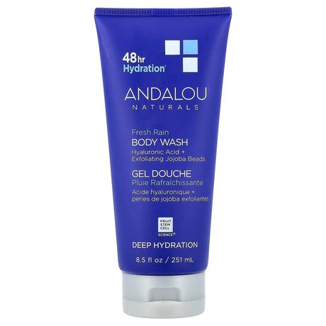 Blue tube of Andalou Naturals body wash on a white background
