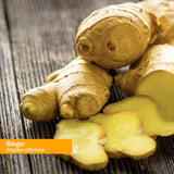 Ginger root on a wooden surface with an orange label