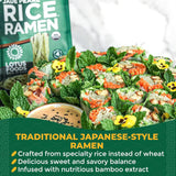 Rice ramen dish with greenery and Lotus Foods packaging in the background