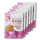 Multiple packages of 'heavenly hunks' birthday cake flavor on a white background